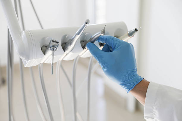 Professional Tooth Extraction technician working in Davie County County, NC